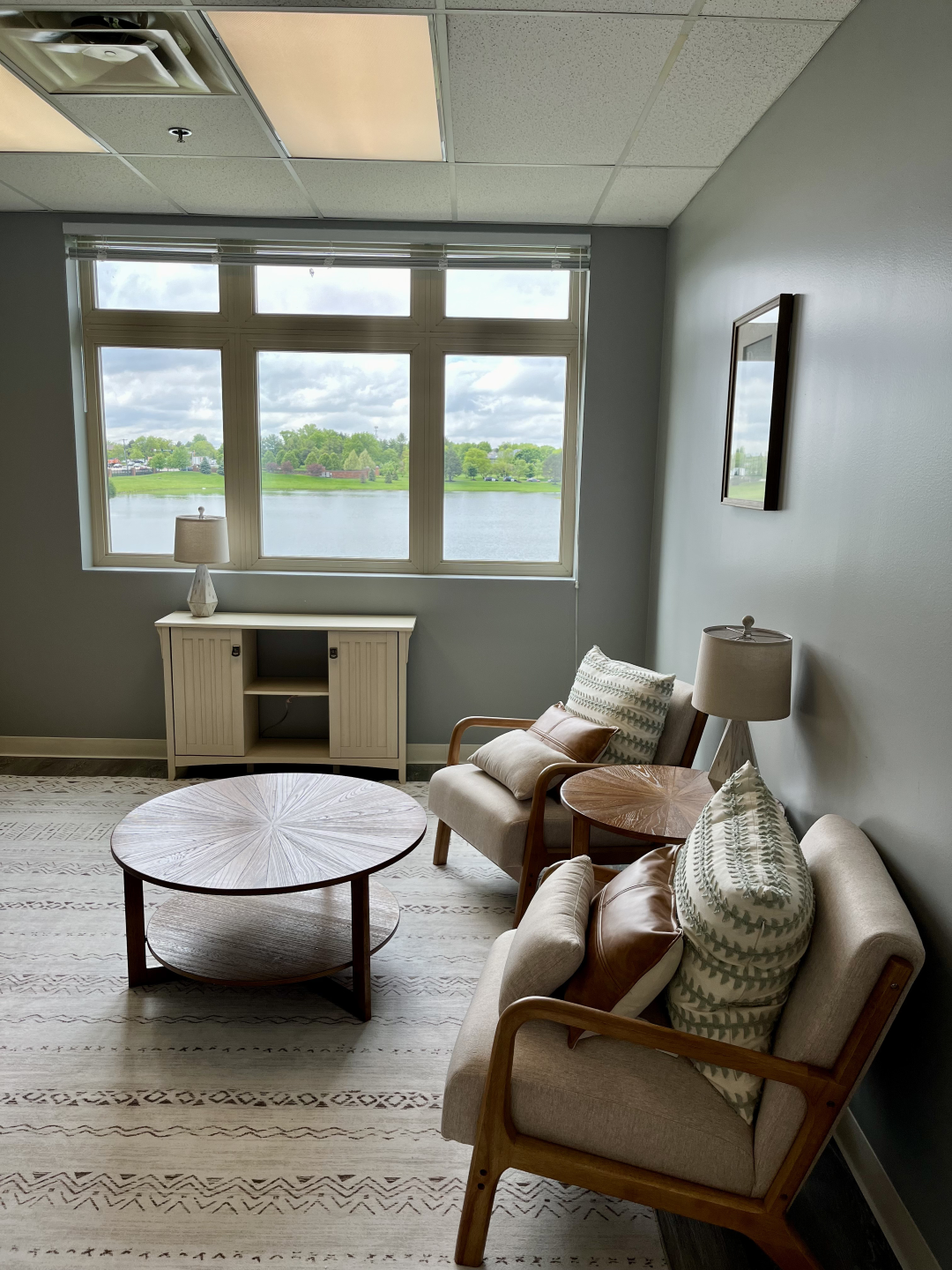 Cozy office lounge with lake view.